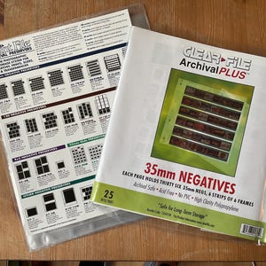 Clear File Archival Plus 35mm Negative Pages (25), and Print File Archival Preservers (11), pg open, Negative Holders, Film Preservation