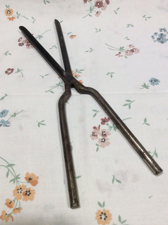 antique marcel curling iron