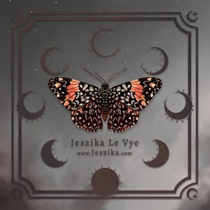May include: A black and orange butterfly with intricate patterns is centred in a square frame with a dark grey background. The frame is decorated with crescent moons and stars. The text "Jeszika Le Vye www.jeszika.com" is below the butterfly.