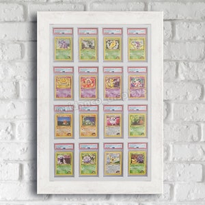 May include: A white frame with 16 clear plastic sleeves holding Pokemon trading cards. The cards feature various Pokemon characters, including Pikachu, Charizard, and Bulbasaur.