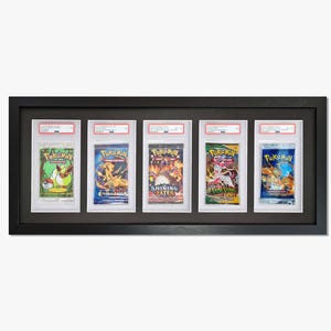 May include: A black frame with six clear plastic sleeves holding Pokemon trading cards. The cards feature different Pokemon characters and the names of the sets: Evolutions, Shining Fates, and Evolving Skies.