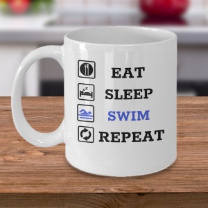 Eat sleep swim repeat - Swimming water sports swim team coffee mug gift - swimmer gift - funny joke swimmer coach gifts - gift for swimmer