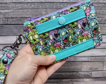 Zombie ID Pouch, Zip ID Case, Minimalist Wallet, Colorful Hungry Zombies and Brains Keychain Coin Purse, Includes Wristlet Strap