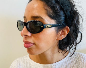 True Vintage 90s Circular Black Oval Sunglasses with Gold Detailing