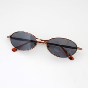 Authentic Vintage 2000s Small Bronze Metal Frame Oval Sunglasses with Grey Reflective Lenses