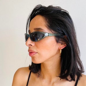 Vintage 90s Transparent Aqua Green Oval Sunglasses