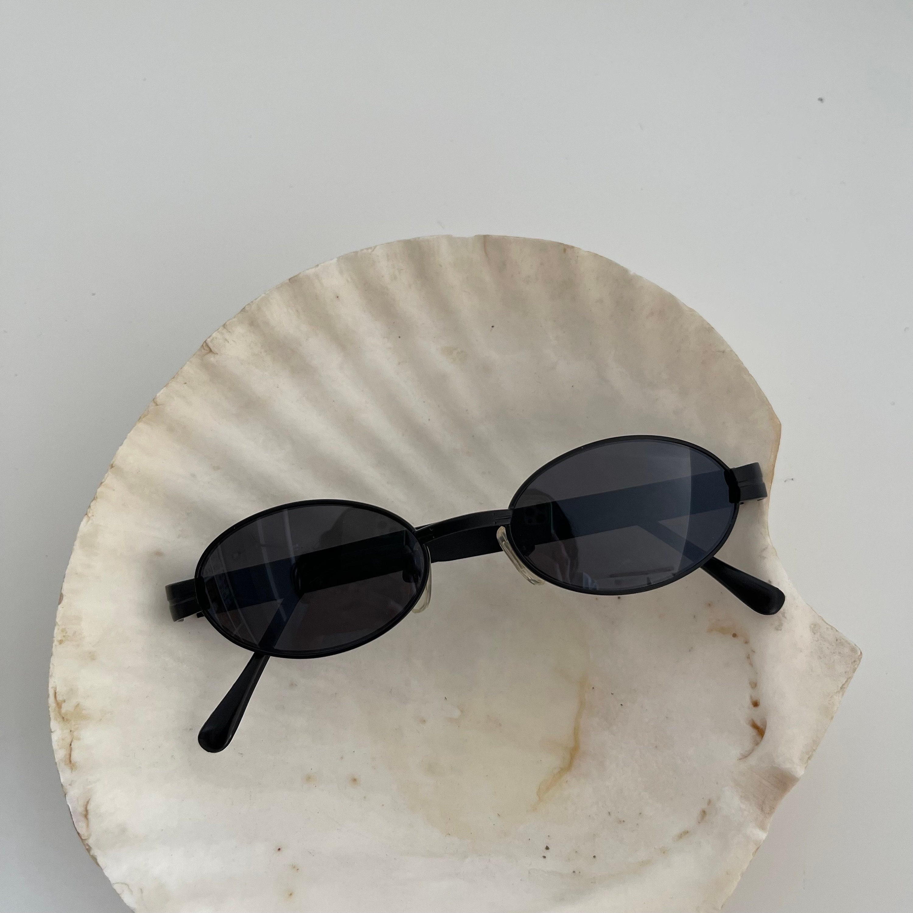 Giorgio Armani Occhiali da vista ovali in metallo nero | AR50763001 Giorgio Armani Occhiali da vista ovali in metallo nero | AR50763001