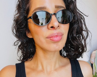 oval black sunglasses