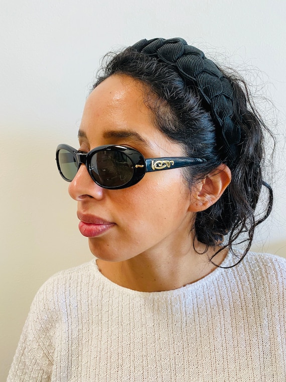 black oval sunglasses