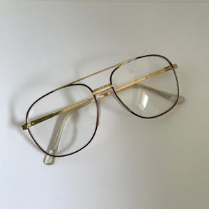 Óculos de sol aviador vintage autênticos dos anos 90 com armação dourada e lentes transparentes