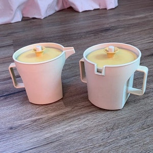 Ensemble Tupperware vintage pour crème d'amandes et sucre avec couvercles