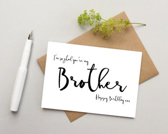 May include: White card with black calligraphy that reads "I'm so glad you're my Brother Happy Birthday xxx".