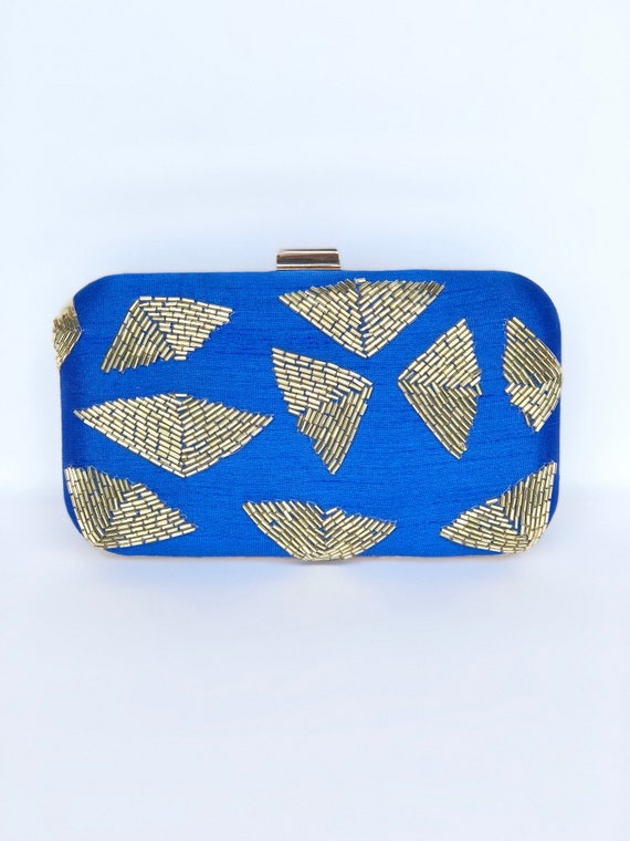 royal blue and silver clutch bag