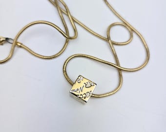 vintage Nina Ricci gold plated necklace with pendant
