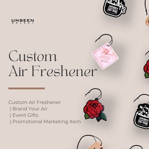 May include: Custom air fresheners with various designs, including a rose, a car logo, and a sunrise. The text "Custom Air Freshener" is displayed on the image, along with the text "Brand Your Air", "Event Gifts", and "Promotional Marketing Item".