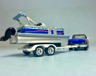 toy pontoon boat with trailer