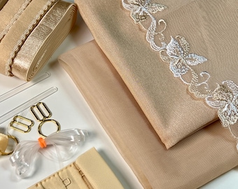 May include: A set of materials for making a bra, including beige mesh fabric, lace trim, elastic, and hardware. The set also includes a bra hook and eye closure.