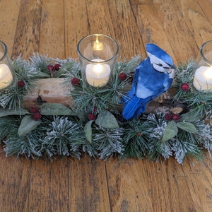 Yule log with blue jay