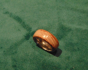 Wood ring with metal insert