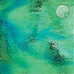 May include: Abstract glass art piece with a rippled water effect. The artwork features shades of green and blue, creating a sense of depth and movement. A circular logo is in the upper right corner.