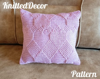 May include: A lavender knitted pillow with a diamond pattern. The pillow is on a brown couch. The text "Knitted Decor" is in the top left corner of the image and the text "Pattern" is in the bottom right corner of the image.
