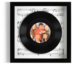 Cliff Richard and The Young Ones Featuring Hank Marvin "Living Doll" Framed 7" Vinyl Record UK NUMBER ONE 23 Mar - 12 Apr 1986