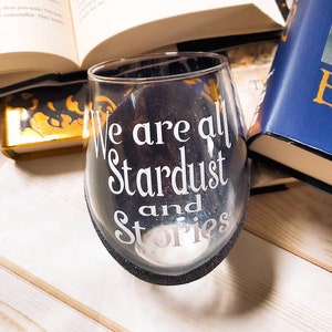 We are all stardust and stories, The starless Sea, glittered wine glass, drinking vessel, bookish