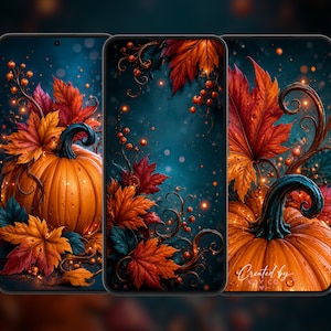 May include: Three smartphones displaying digital autumn-themed wallpaper featuring vibrant orange pumpkins, deep red and gold maple leaves, and small berries against a dark teal background with glowing bokeh lights and the text Created by Kay Co.