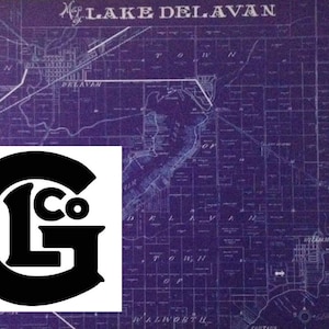 May include: A vintage map of Lake Delavan, Wisconsin, with a black and white logo for L.G. Co. in the lower left corner.