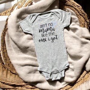 Ain’t no Mama like the one I got / mom / mama / momma / momlife/ baby/ bodysuit / lyrics / music/ baby/ newborn / baby shower