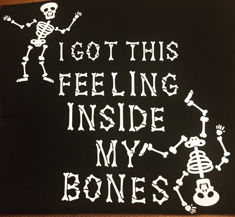 May include: Black and white graphic design with two skeletons. The text reads "I got this feeling inside my bones".