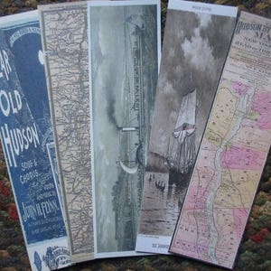 May include: Four vintage bookmarks with different designs. The first bookmark is blue with the text "Dear Old Hudson" and "Song & Chorus". The second bookmark is a map of the Hudson River. The third bookmark is a black and white image of a ship on the Hudson River. The fourth bookmark is a map of New York City with the text "Hudson by Daylight Map New York City Head of the Tide Water".