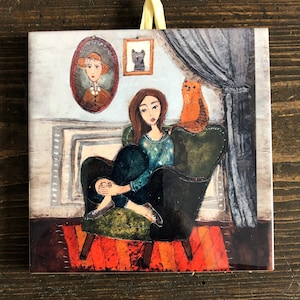 セラミックタイル、猫と一緒に肘掛け椅子に座る女の子、子供部屋、アート絵画、芸術的なイメージ
