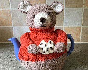 Hand knitted teddy bear tea cosy