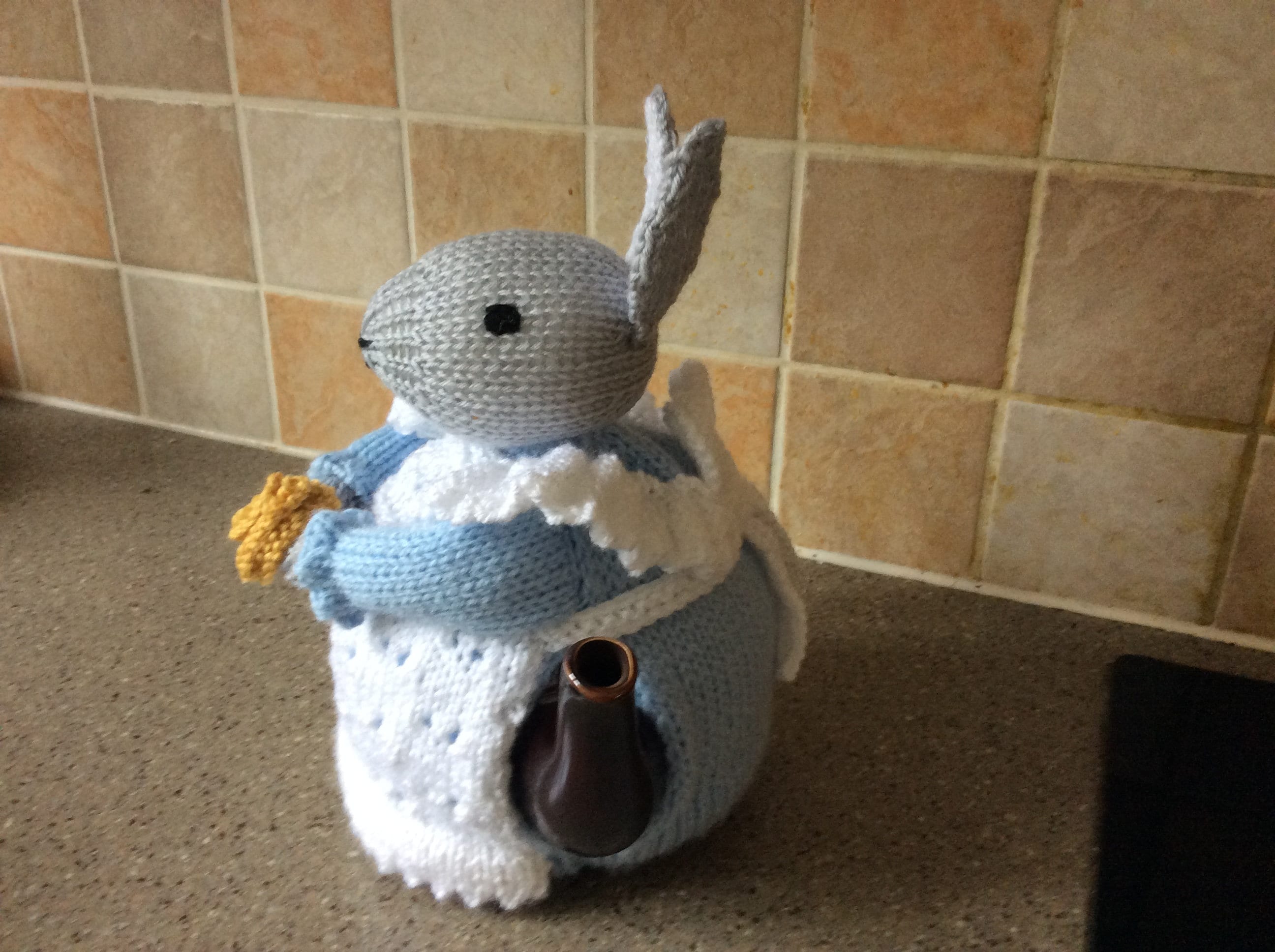 Hand knitted bunny tea cosy