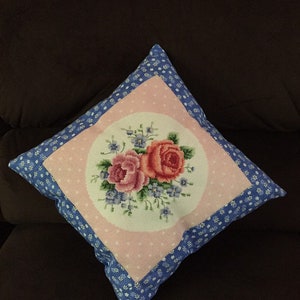 Counted cross stitch floral pillow