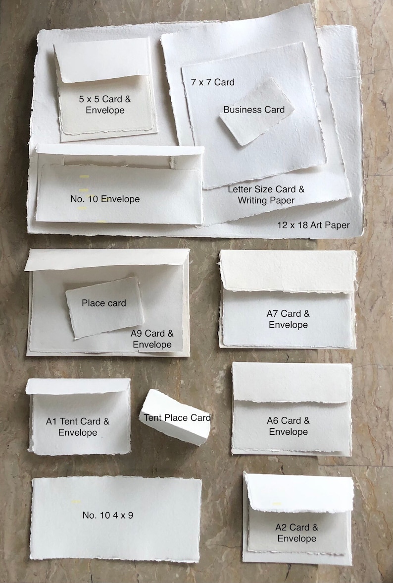 May include: A variety of white card and envelope sizes, including 5x5, 7x7, A1, A2, A6, A7, A9, and No. 10. The cards and envelopes are made of textured paper and have a rustic, handmade look.
