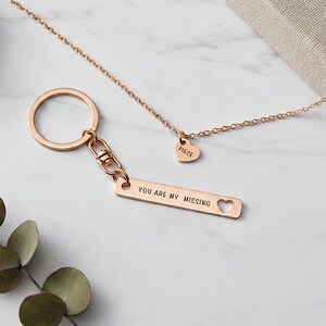 Belle Fever missing piece necklace and keychain set flatlay, romantic date gift, couple jewellery keepsake, anniversary memory daily wear piece