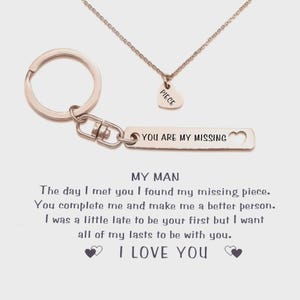 Belle Fever rose gold missing piece necklace and keyring set displayed with heartfelt card message