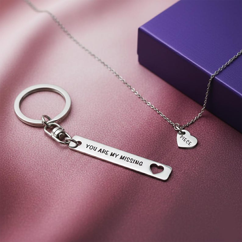 Belle Fever missing piece necklace and keychain set on purple silk, romantic couple jewellery, anniversary gift idea, personalised keepsake for daily wear