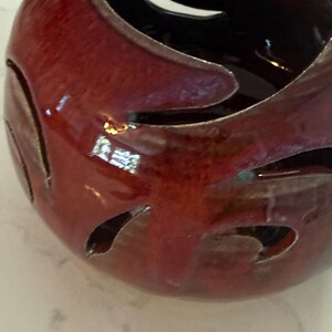 Handmade Ceramic Yarn Bowl, Artisan Studio Pottery Knitting Crochet Bowl, Glossy Oxblood Red Glaze with Cutouts, Signed Maker’s Mark