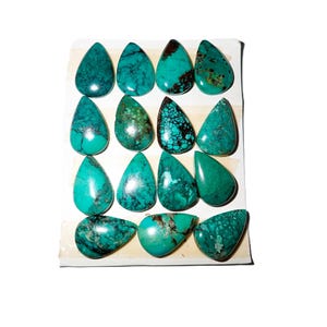 Hubei/Tibetansk turkos stenpäron 13 x 20 mm platt cabochon 115,5 karat 15 stycken