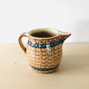 Antique clay pot, ceramic, earthenware, jug, milk pot, hand-made, swirled decoration, farmhouse pottery, old farmhouse decoration, shabby,