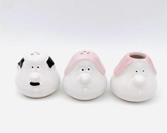 Vintage salt and pepper shakers with toothpick holders shaped like funny faces