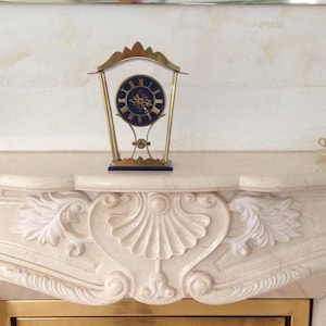 Table mantel clock «Pavillon» by ebg in elegant design 70s deco table clock