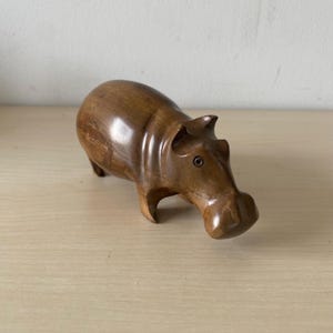 Hippopotamus made of hardwood, hand-carved wooden figure made of precious wood
