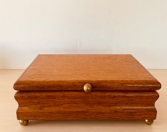 Beautiful wooden casket on brass feet, wooden box, jewelry box made of wood