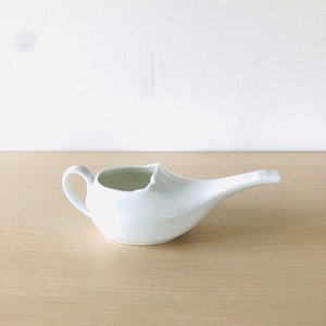 Vintage white porcelain sauce boat, with handle