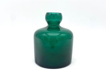antique green glass vase made of forest glass, mouth-blown