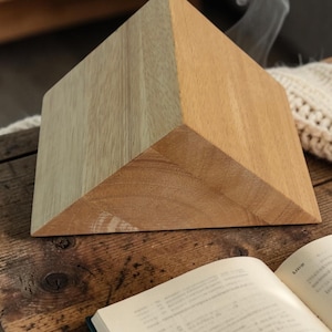 May include: A set of three ceramic mugs with a speckled, matte finish. The mugs are in shades of cream, light brown, and dark brown. Each mug has a simple, minimalist design, perfect for coffee or tea.